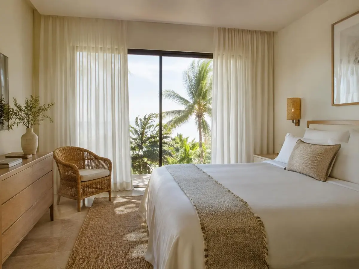 Private room with natural linen and wooden furniture